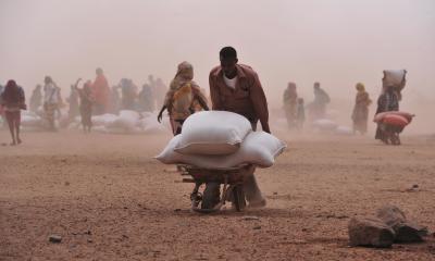 A Somali pastoralist with food ration bags